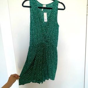 Green flowy patterned romper